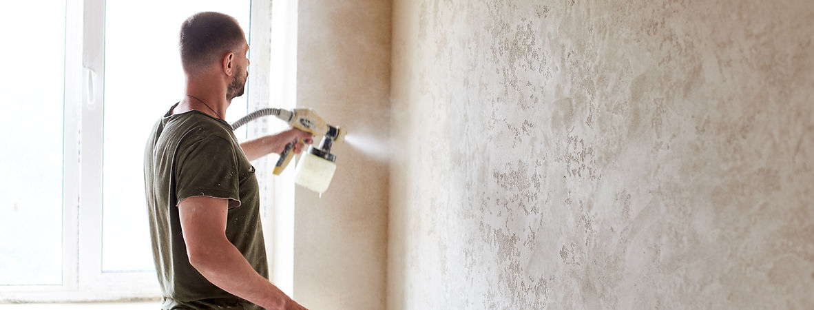 A man painting a wall