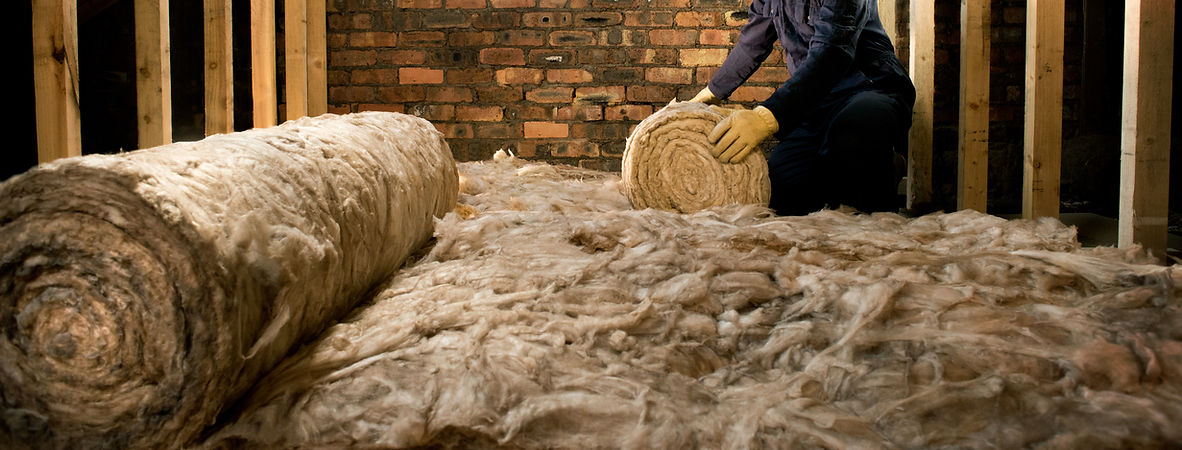a person laying insulation