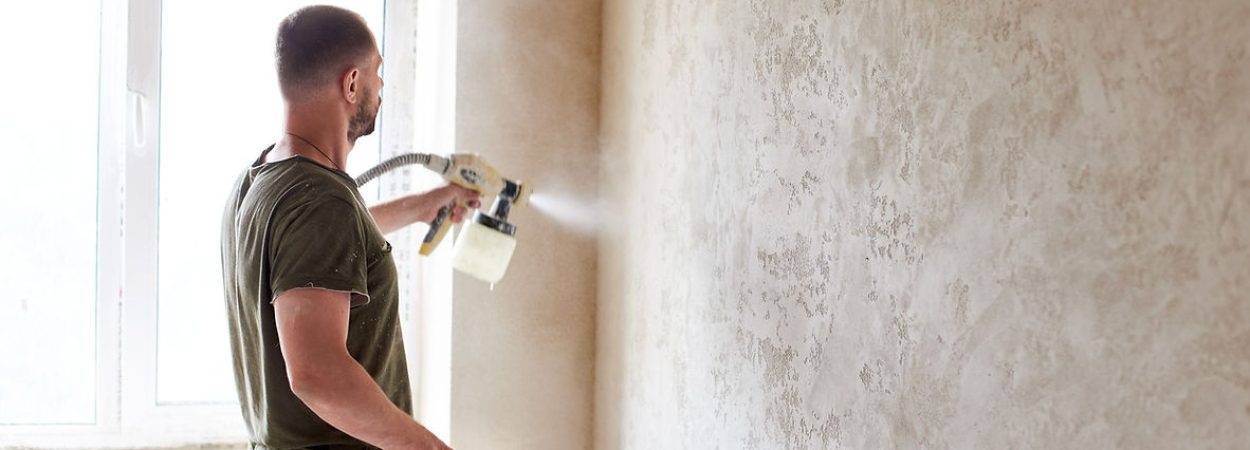 A man painting a wall